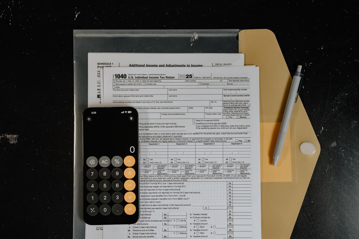 Calculator and tax forms representing standard deduction in new tax regime 2026